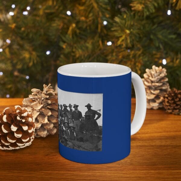 Blue mug with a photo of soldiers.