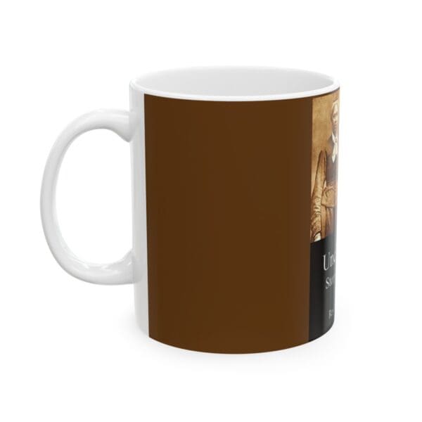 White mug with a brown design and text.