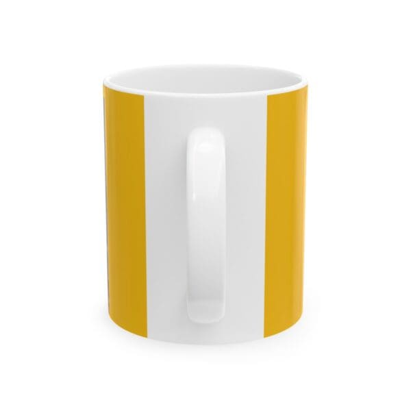 White mug with yellow stripes.