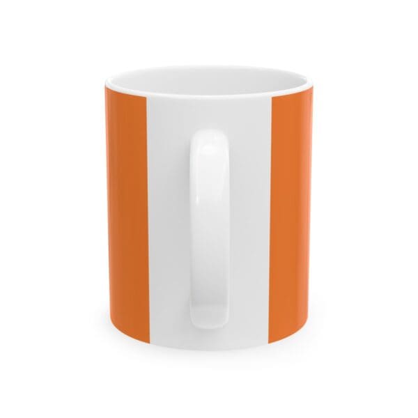 White mug with orange stripes.