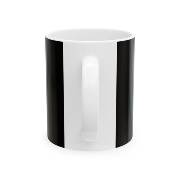 White mug with black stripes.