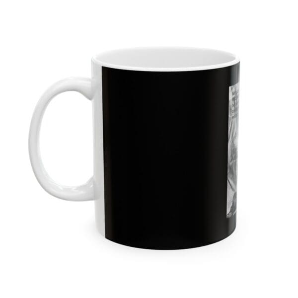 White coffee mug with black design.