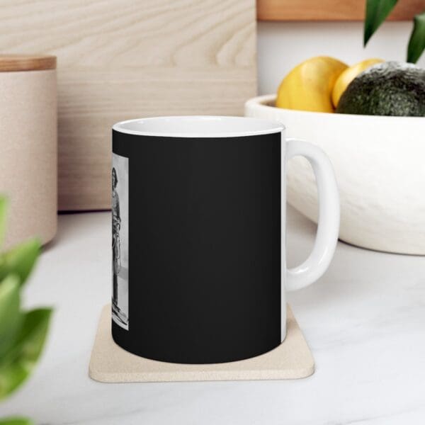 Black mug with a vintage photo of a woman.