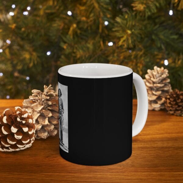 Black mug with image of a woman skiing.