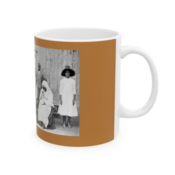 Black and white photo of people on a mug.