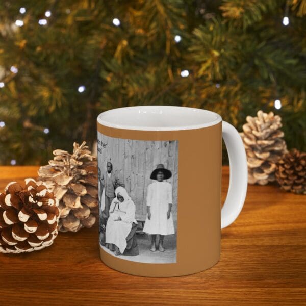 Black and white photo of four people on a mug.