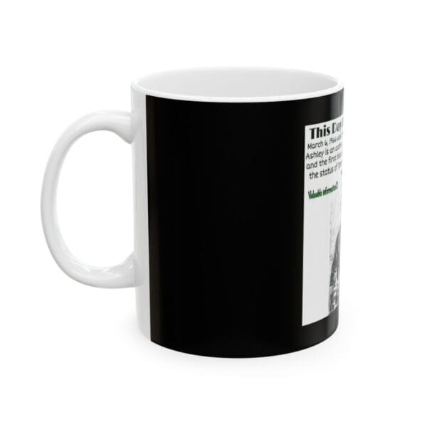 Black coffee mug with white text.