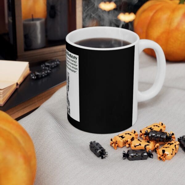 Black coffee mug with Halloween candy.