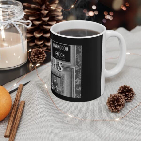 Black mug with vintage graphic design.