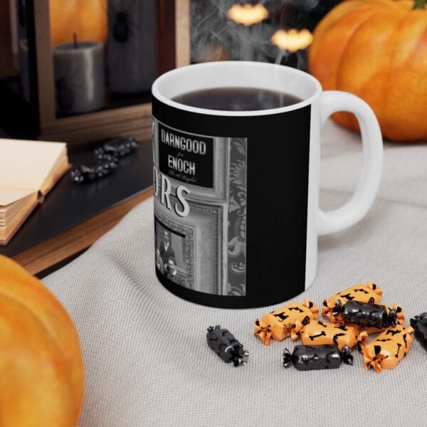 Black coffee mug with Halloween design.