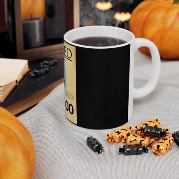 Black coffee mug with Halloween design.