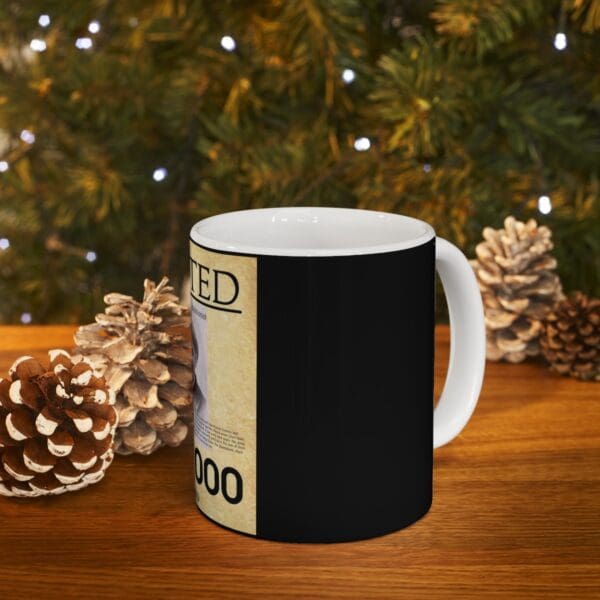 Black mug with a wanted poster design.