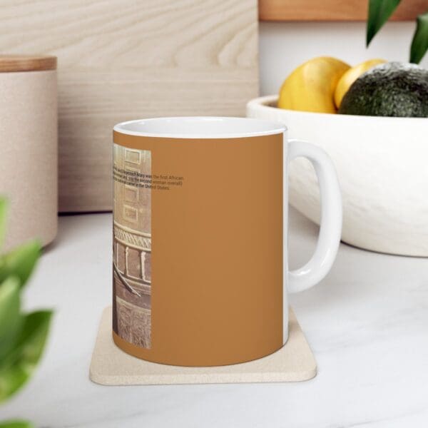 White mug with a tan background.