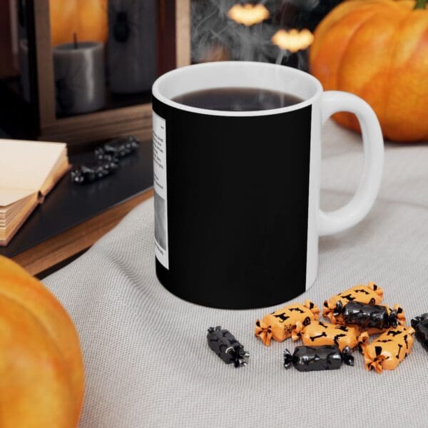 Black coffee mug with Halloween candy.