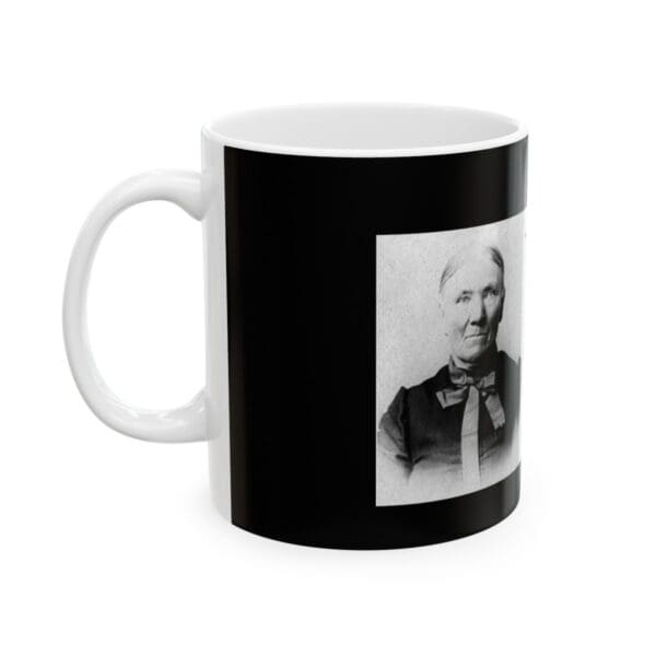 Black mug with a photo of an older woman.