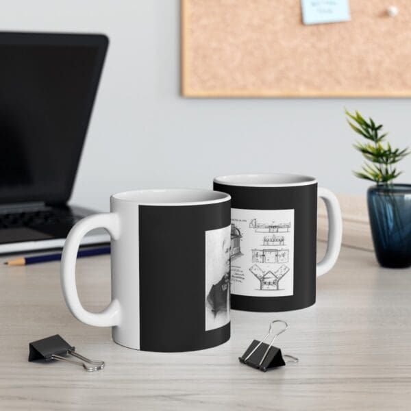 Two white mugs with black designs.