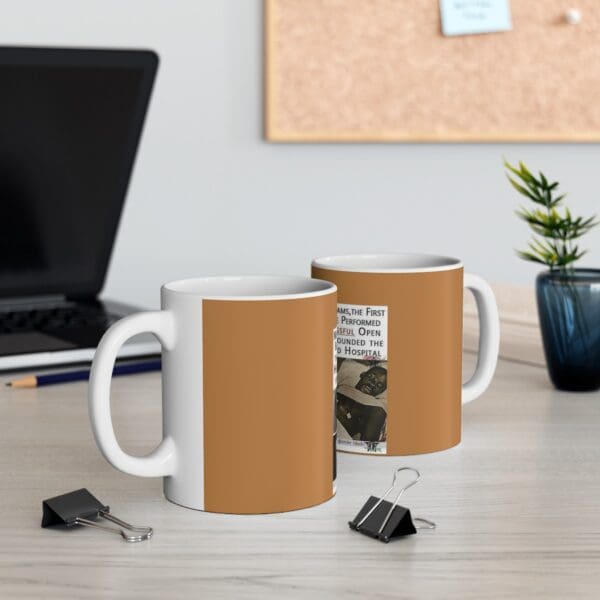 Brown mug with a black and white image.