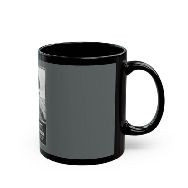 Black mug with a gray image of a man.