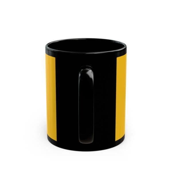 Black mug with yellow stripe and handle.