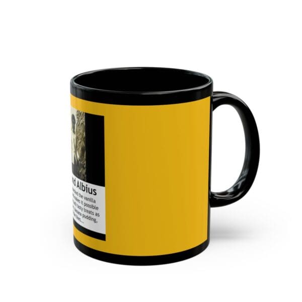 Black mug with yellow and white design.