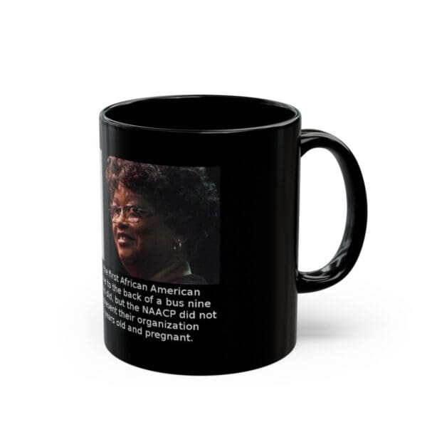 Black mug with a woman's portrait.