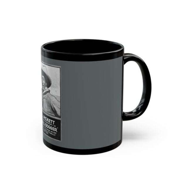 Black mug with a picture of a man.