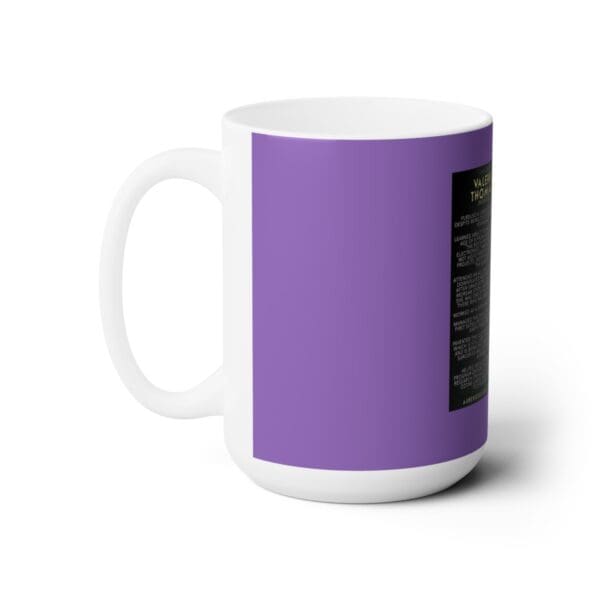 White mug with a purple design.