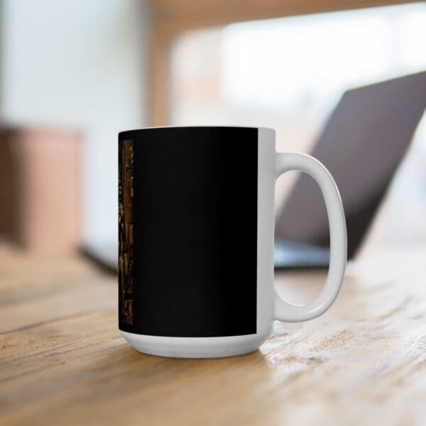 White coffee mug with black design.