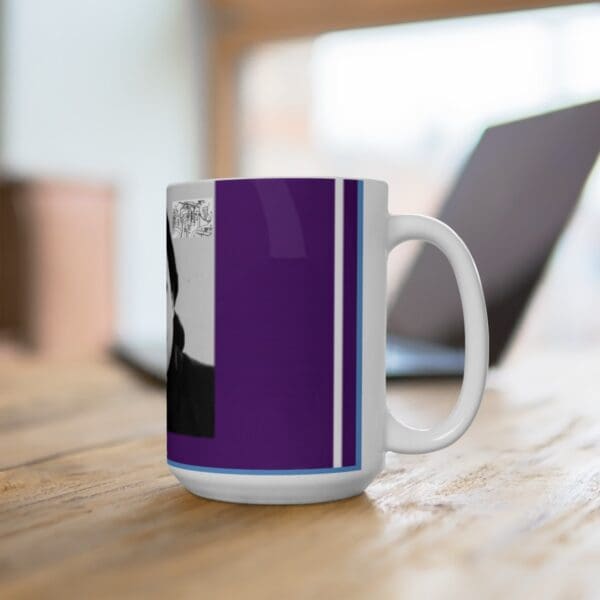 White mug with a purple design and a black and white image.