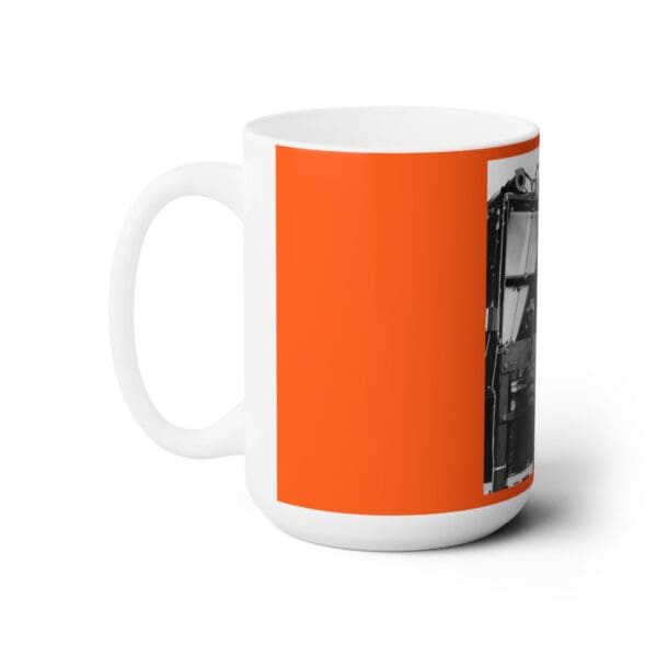 White mug with orange background and black and white photo.