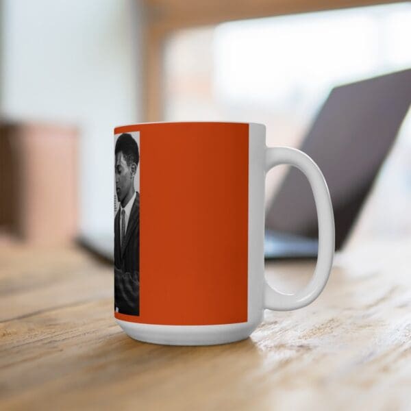 White coffee mug with a man in a suit.