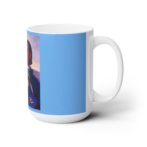 White mug with a blue background and a portrait.