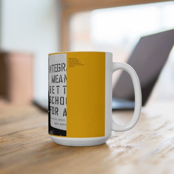 White mug with yellow text and image.