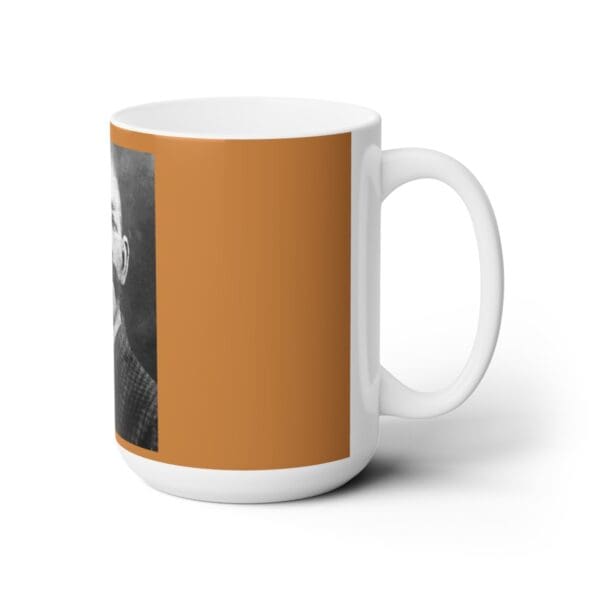 White mug with a black and white photo of a man.