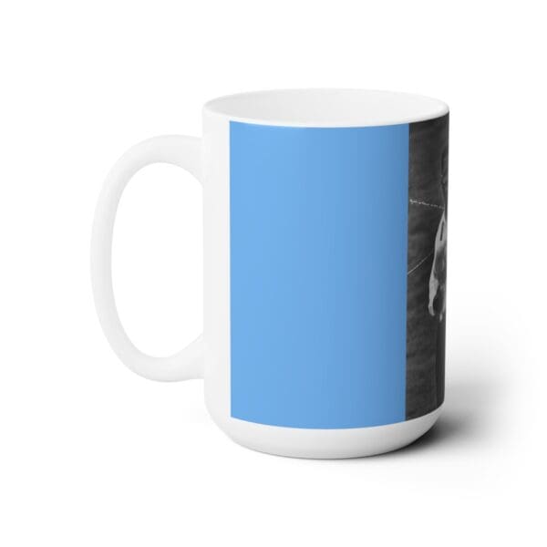 White mug with a blue background and a photo.