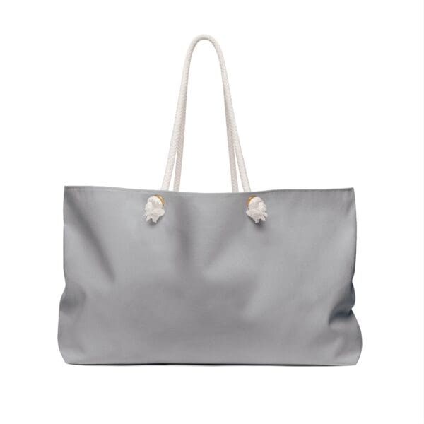 Gray canvas tote bag with rope handles.