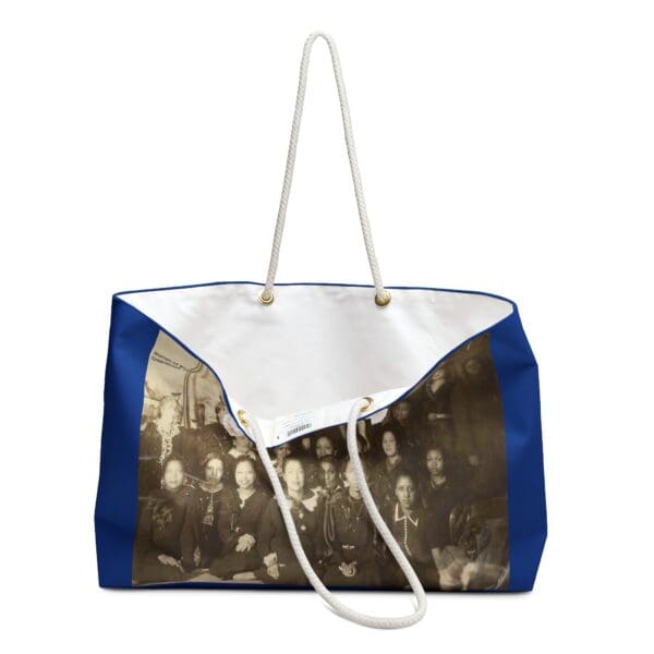 Blue tote bag with vintage photo of women.