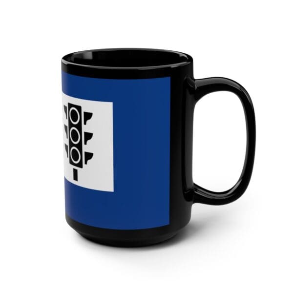 Black mug with traffic light flag design.