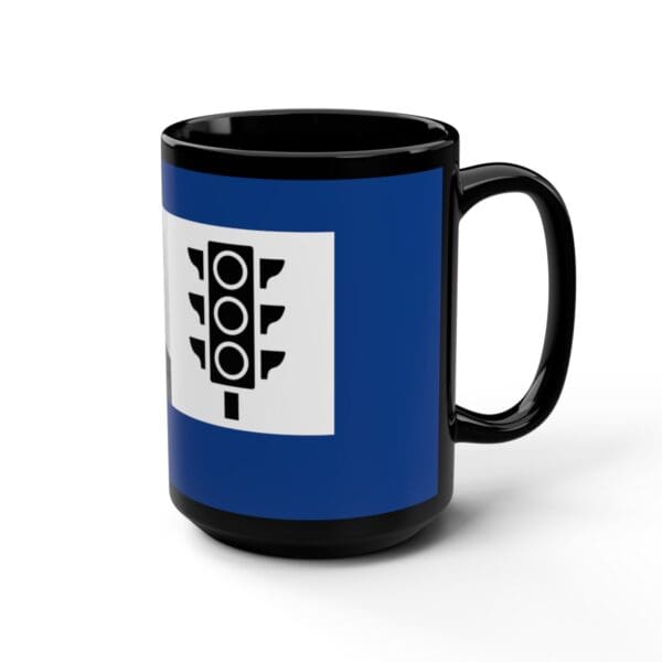 Black mug with traffic light design.