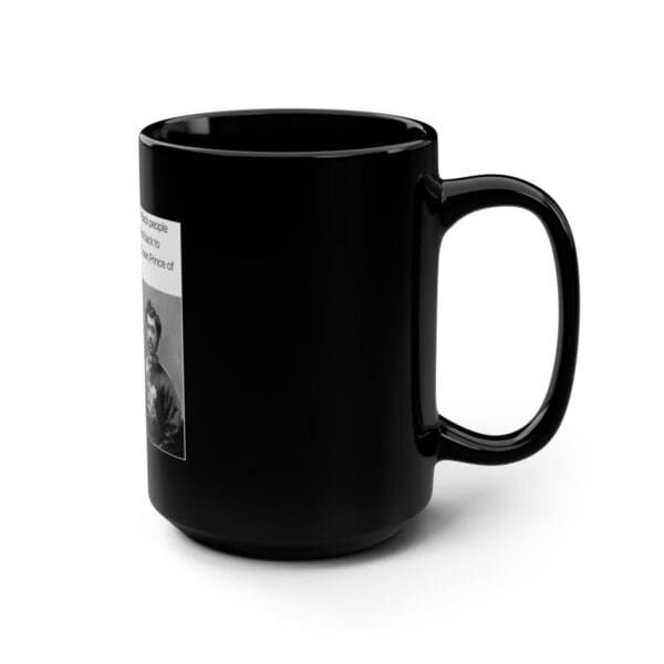 Black coffee mug with a man's image.