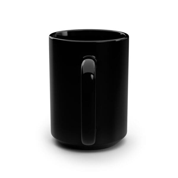 Black ceramic mug with handle.