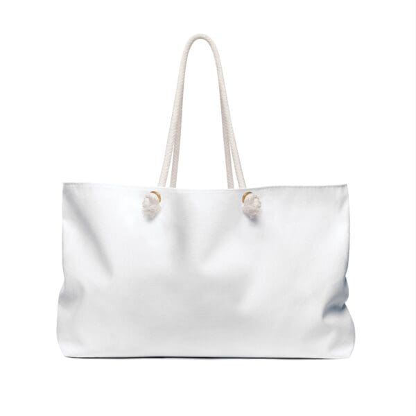 White canvas tote bag with rope handles.