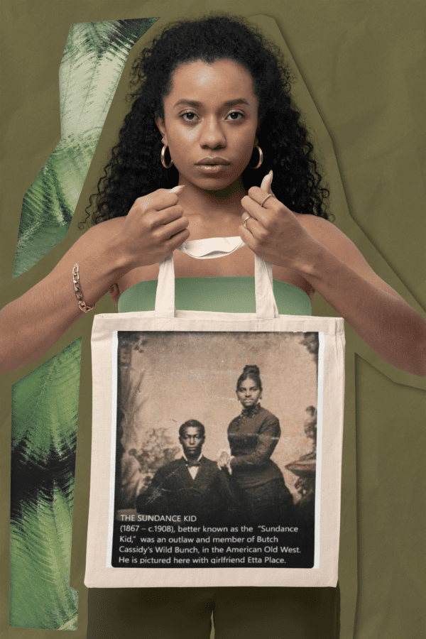 Woman holding tote bag with photo of Sundance Kid.