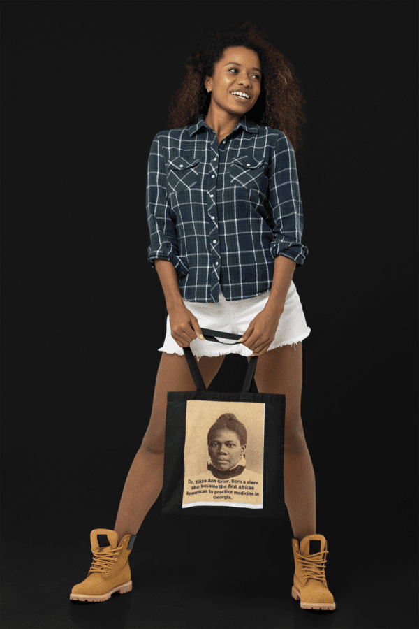 Woman holding a tote bag with Dr. Eliza Ann Grier.