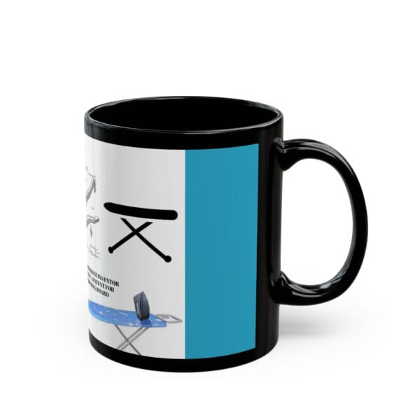 A black coffee mug with a picture of a boat.