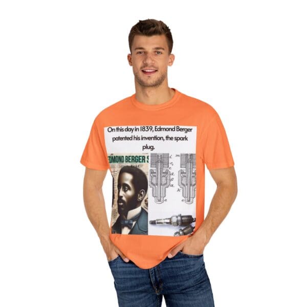 A man wearing an orange t-shirt with a newspaper picture on it.