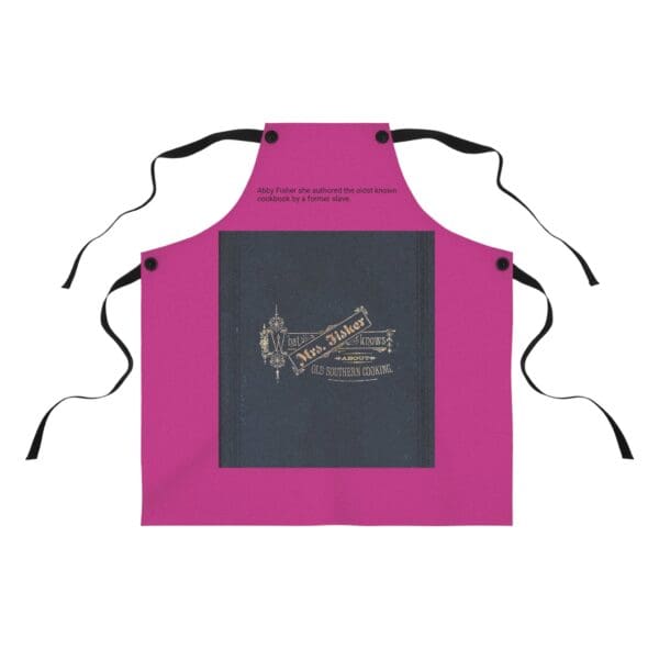 A pink apron with black and white writing on it.