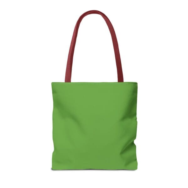 A green tote bag with red handles and an empty space.