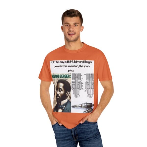 A man wearing an orange t-shirt with a newspaper advertisement.