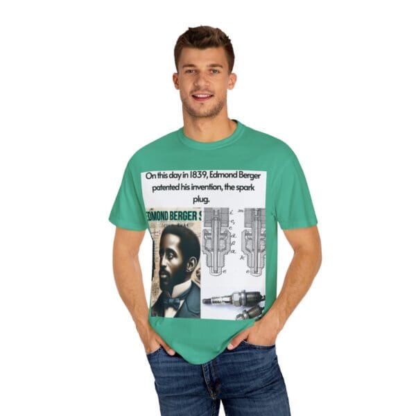 A man wearing a green t-shirt with an image of a person.